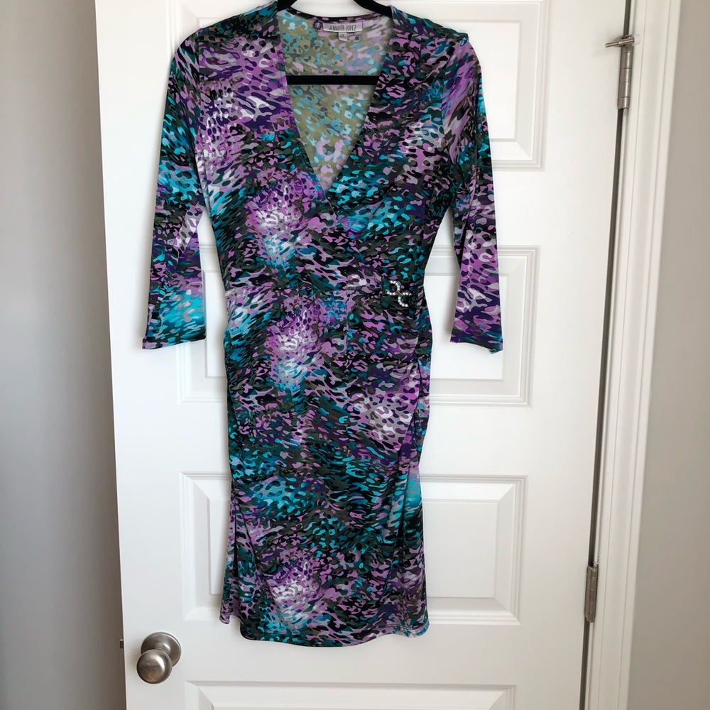 Women’s fitted multi color dress.